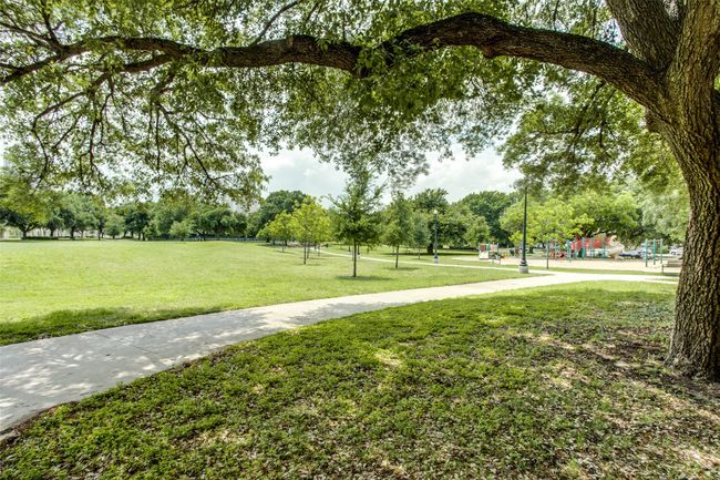 View of home's community featuring playground community and a lawn | Image 37