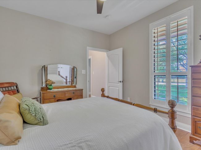 Bedroom featuring a ceiling fan and baseboards | Image 25