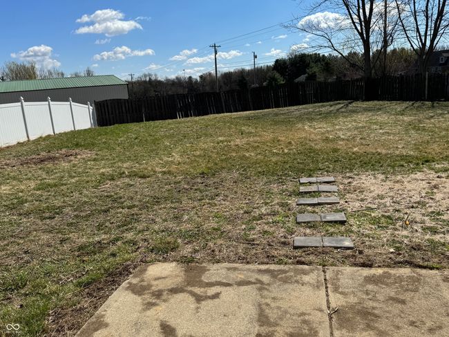 view of yard featuring fence | Image 16