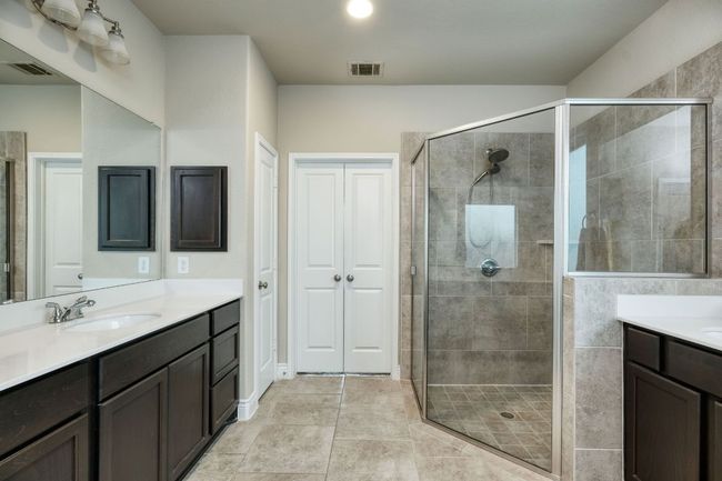 Another view of the walk-in shower. This bathroom also has a large walk-in closet. | Image 14