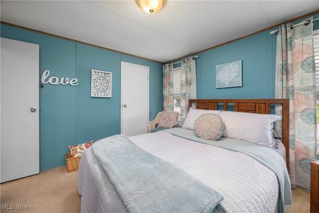 Carpeted bedroom featuring ornamental molding | Image 31