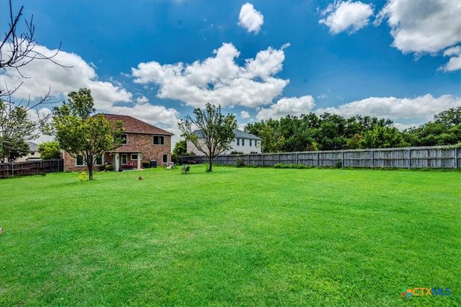 .5 acre backyard with storage shed | Image 27