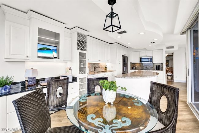 Dining space featuring recessed lighting, light wood-style floors, and visible vents | Image 18