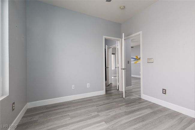 Unfurnished room featuring baseboards and wood finished floors | Image 17