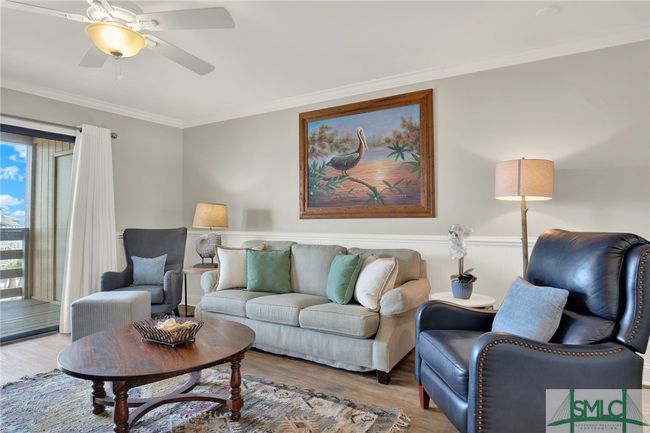 Living Room open to Kitchen & Dining Area with Sliding Glass Door to Spacious Balcony | Image 7