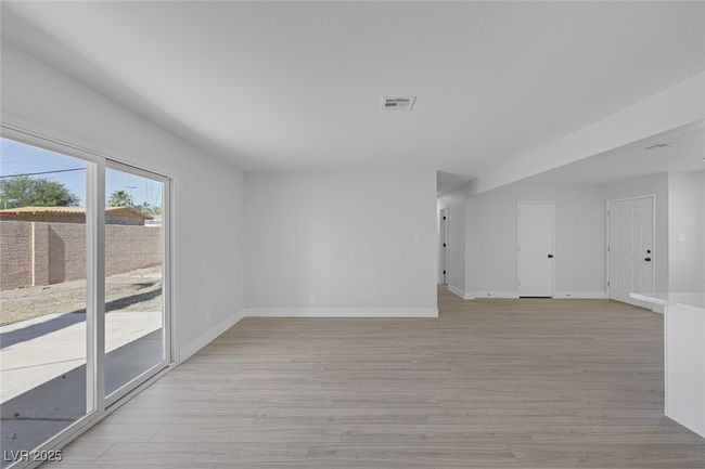 Spare room with light wood-style flooring | Image 18