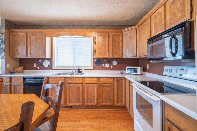 1201 49 Avenue, Home with 5 bedrooms, 2 bathrooms and 1 parking in Lloydminster SK | Image 9