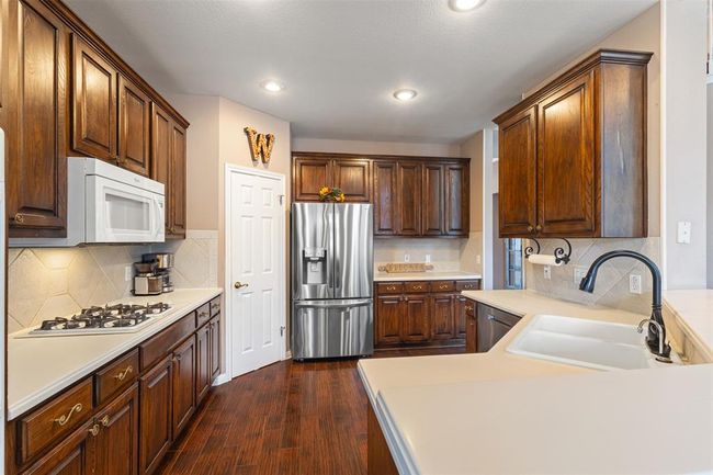 Gas stove top and the refrigerator can covey with the sale. | Image 7