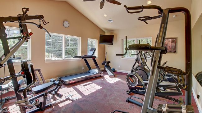 Clubhouse for Members includes, pool table, fooseball table, poker table, gym with mirror and nice sitting areas by the fireplace. | Image 35