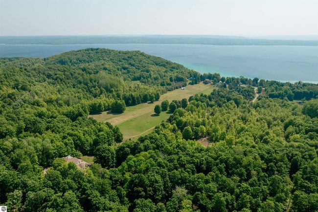 3970 N West Torch Lake Dr, House other with 4 bedrooms, 5 bathrooms and null parking in Kewadin MI | Image 6