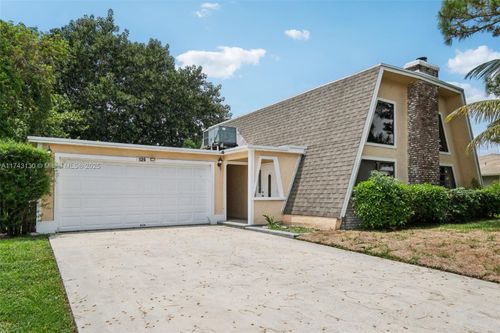 126 Barcelona Dr, Royal Palm Beach, FL, 33411-1313 | Card Image