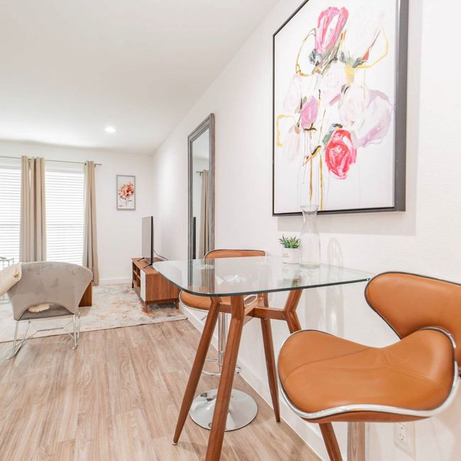 Dining room with baseboards, light wood-style flooring, and recessed lighting | Image 6