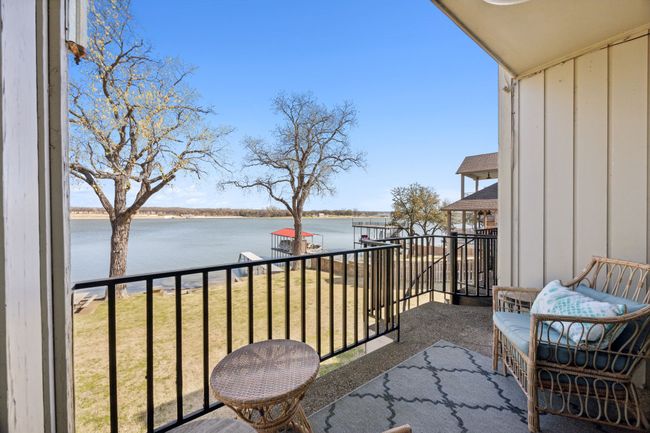 Balcony over looking the lake off of living room. | Image 18