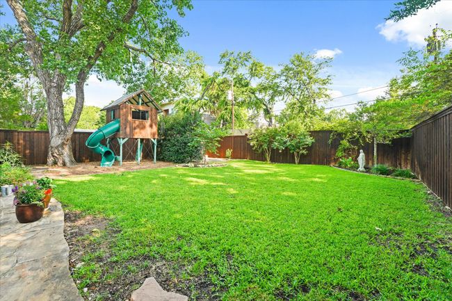 View of yard featuring a playground | Image 32