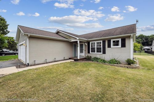 696 Jessica Cir, Fowlerville, MI, 48836-8593 | Card Image