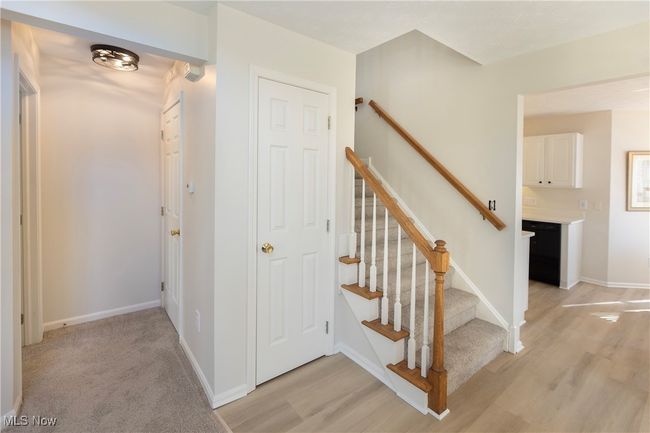 Stairway to the 2nd floor loft, storage area and more bedrooms | Image 30