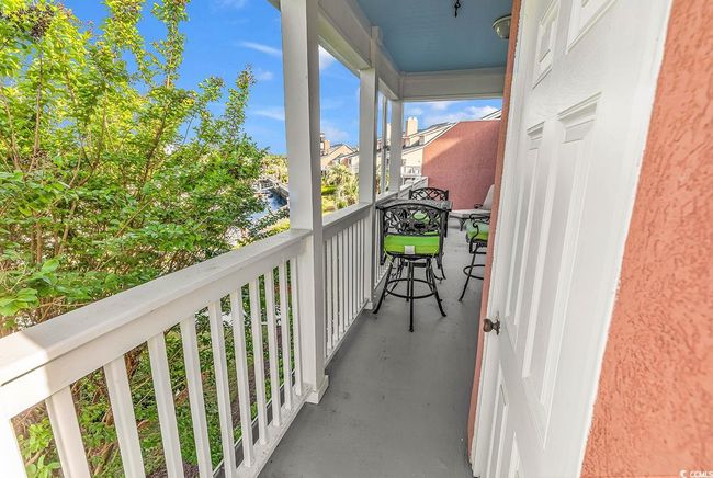 Balcony featuring a water view | Image 30