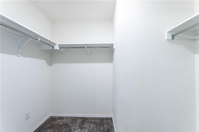 Walk in closet featuring carpet flooring | Image 23