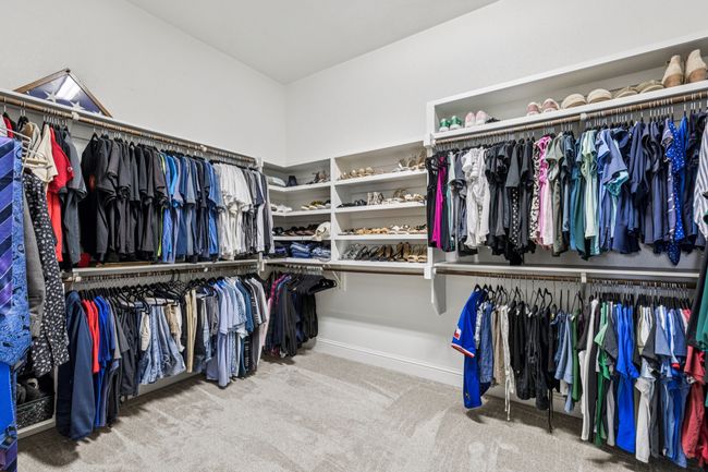 Walk in closet featuring carpet flooring | Image 22