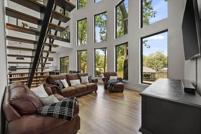 Banks of windows provide natural lighting and breathtaking views! | Image 9
