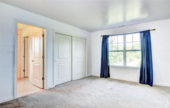 2nd bedroom featuring carpet flooring, a closet | Image 21