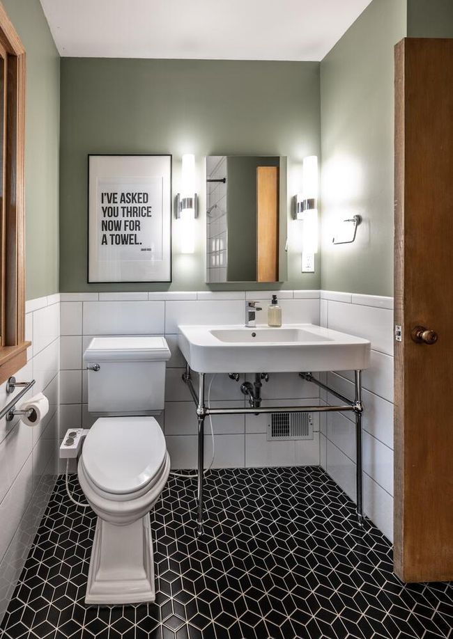 Main floor full bathroom with tile floors, tile surround & window. (Tub & shower not shown). | Image 18