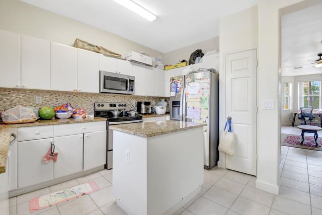 1910 Shoma Dr, Condo with 3 bedrooms, 4 bathrooms and null parking in Royal Palm Beach FL | Image 19