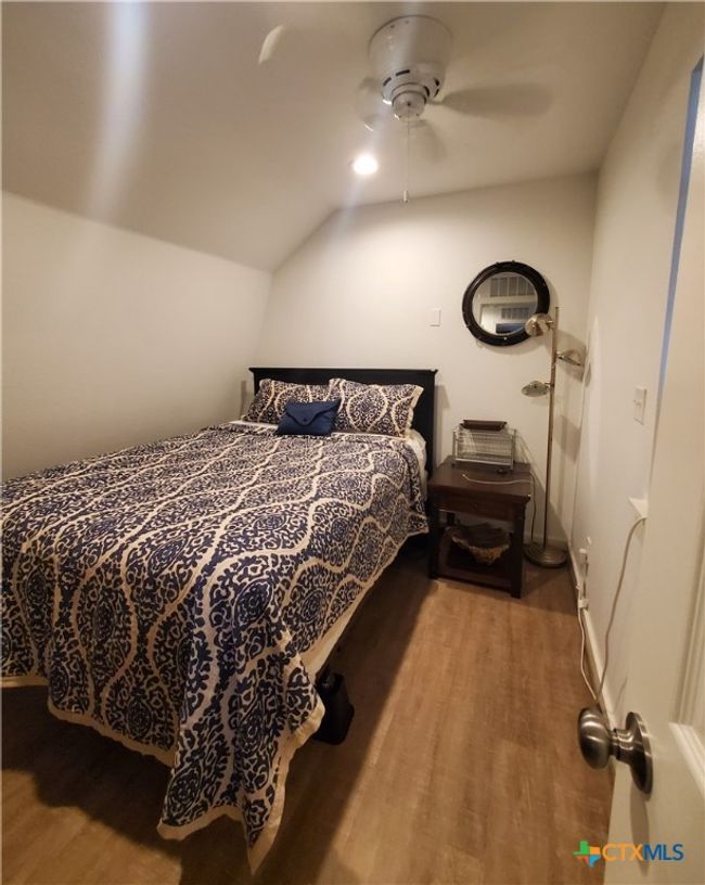 Bedroom #2 accommodates full-queen bed, has WAC & ceiling fan. | Image 15
