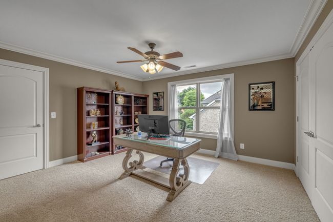 This second-floor bedroom is being used as an office; what a great idea! | Image 36