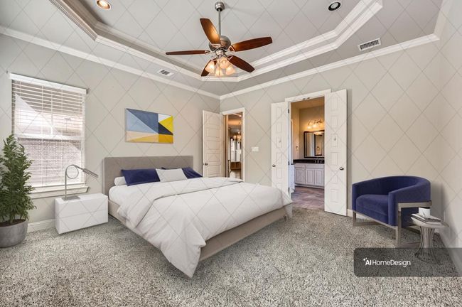 Carpeted bedroom with crown molding, ceiling fan, and ensuite bath | Image 17
