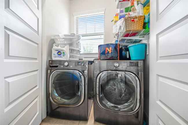 Laundry area featuring separate washer and dryer | Image 12