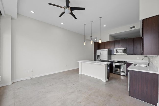 Kitchen open to living area | Image 8