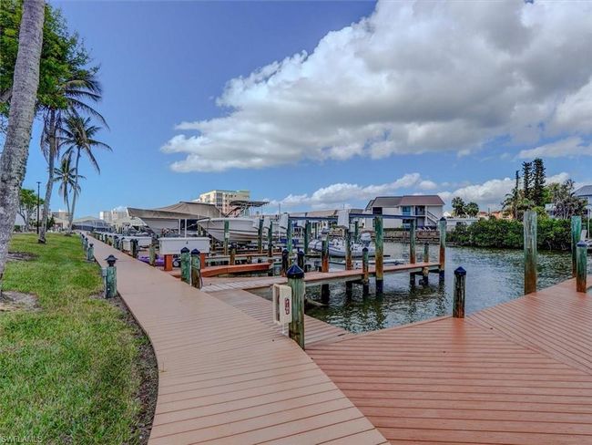 COMMUNITY DOCKS. DOCKS MAY BE AVAILABLE FOR LEASE OR PURCHASE WITHIN HIBISCUS POINTE AND/OR THE BAY BEACH AREA. | Image 39