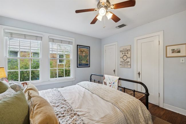 Bedroom #1 with beautiful stained glass windows, real hardwood floors, and tons of natural light | Image 33