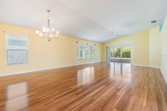 A grand, large great room with dining area | Image 7