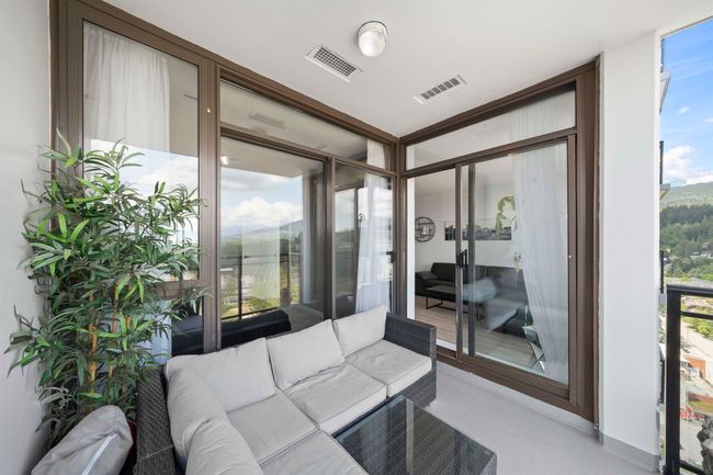 Sunroom / solarium with floor to ceiling windows and outdoor lounge area | Image 18