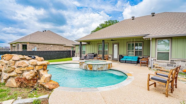 View of pool & covered patio | Image 23