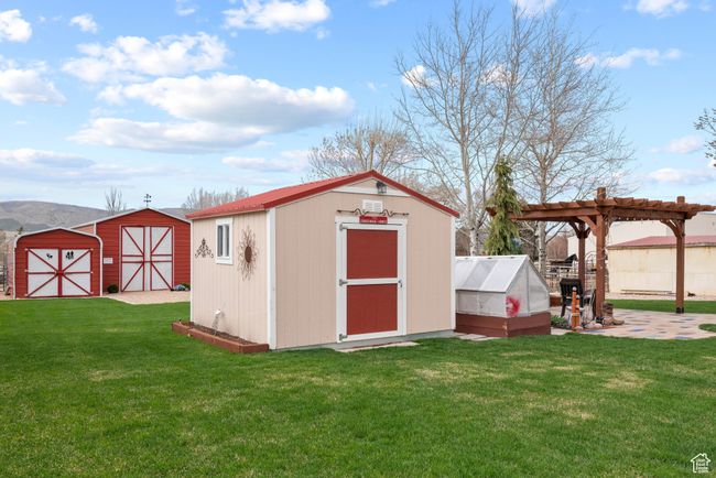 View of shed with a pergola | Image 29