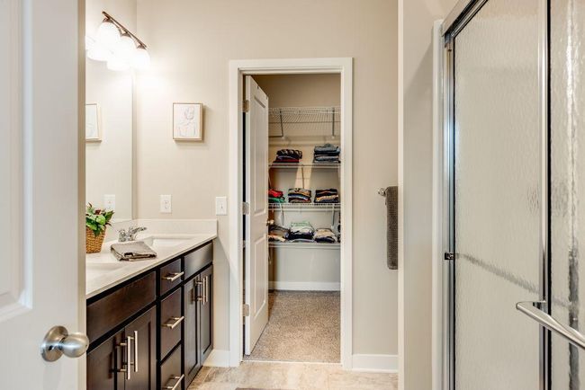 The master suite also features a spacious walk in closet | Image 11