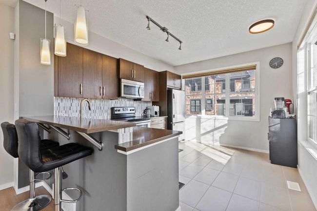 452 Ascot Cir Sw, Townhouse with 3 bedrooms, 3 bathrooms and 3 parking in Calgary AB | Image 8