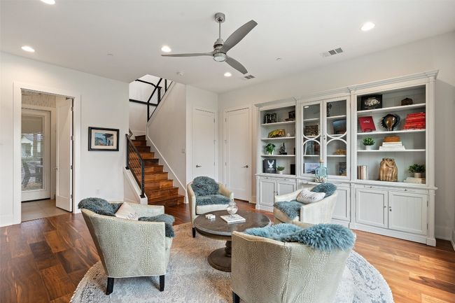 A warm and inviting front sitting room with thoughtful design details. | Image 27