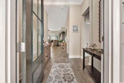 Entrance foyer featuring crown molding and light hardwood / wood-style floors | Image 3