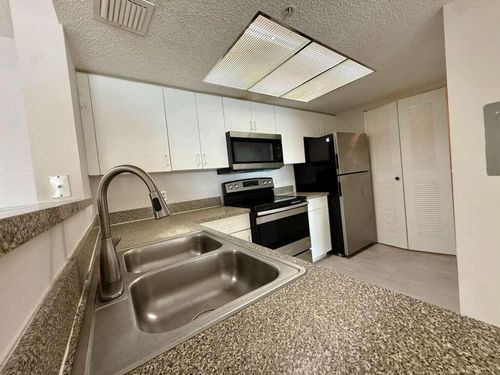 206-5035 Wiles Rd, Coconut Creek, FL, 33073-4208 | Card Image