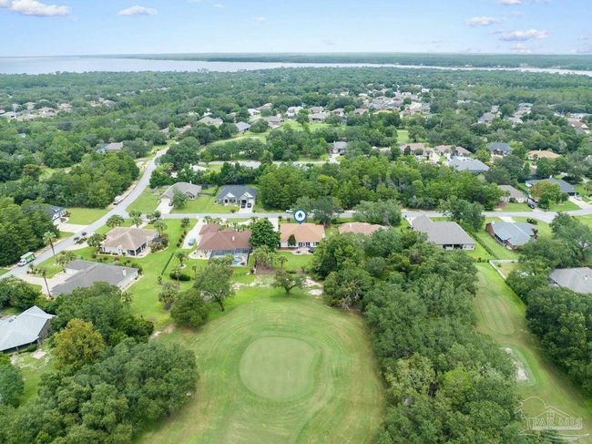 7008 Turnberry Cir, House other with 4 bedrooms, 2 bathrooms and 3 parking in Navarre FL | Image 64