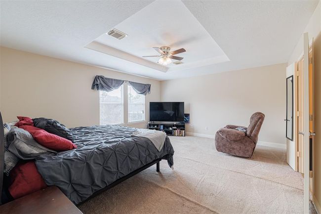 Primary suite with tray ceilings. | Image 16