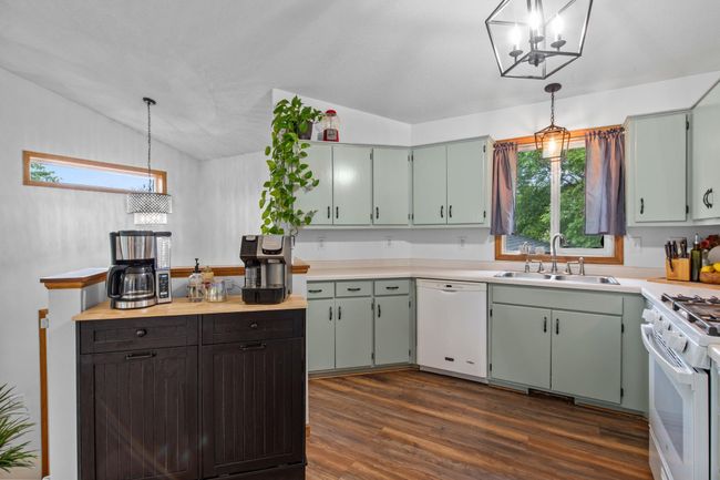 The custom recycling center with 2 pull outs for trash and recycling was the perfect addition to this kitchen giving you added counter space. | Image 5