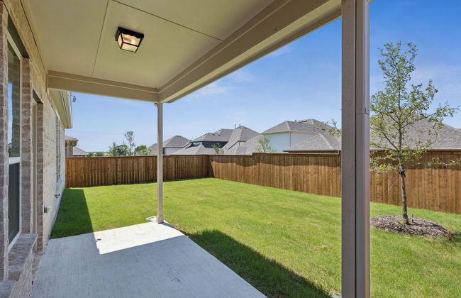 Oversized yard with covered patio *Real home pictured | Image 15