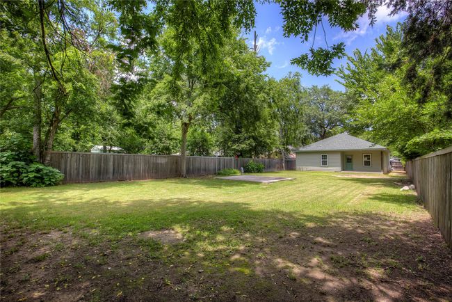 View of fenced backyard | Image 31