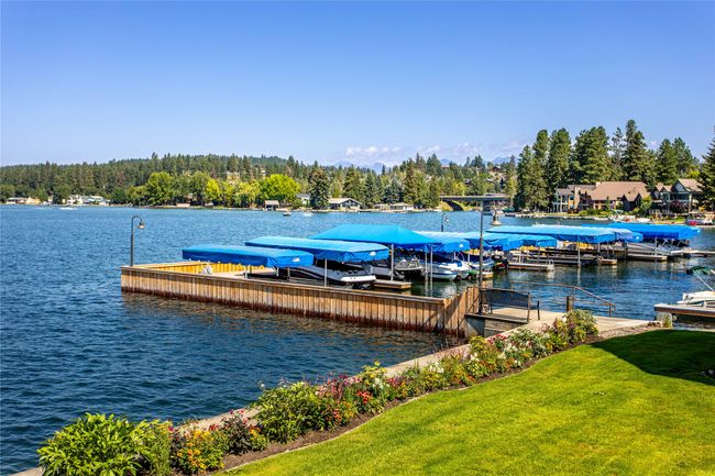 Dock area featuring a water view and a yard | Image 29
