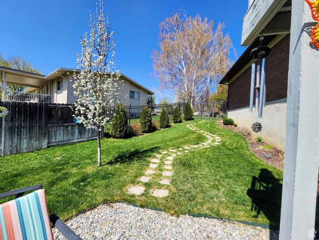 View of yard with fence | Image 52